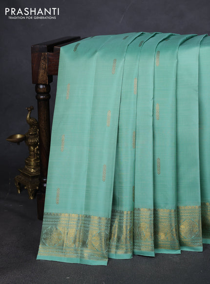 Pure kanchipuram silk saree pastel green with zari woven buttas and zari woven border