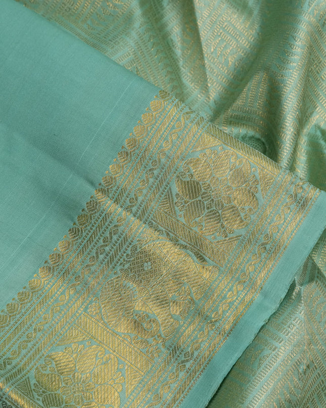 Pure kanchipuram silk saree pastel green with zari woven buttas and zari woven border