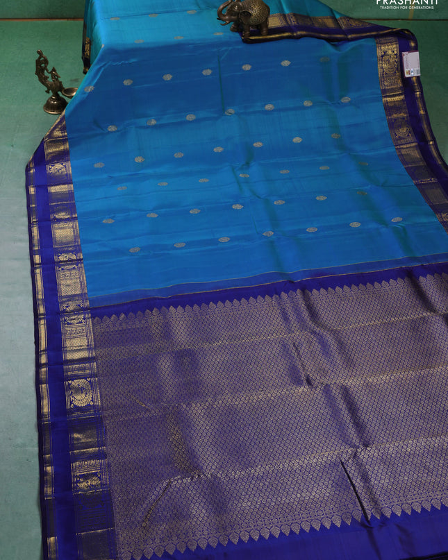 Pure kanchipuram silk saree teal blue with zari woven buttas and zari woven border