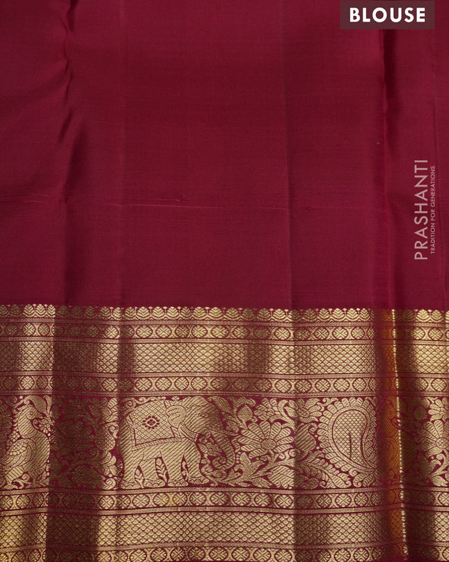 Pure kanchipuram silk saree maroon with allover zari checks & buttas and zari woven border