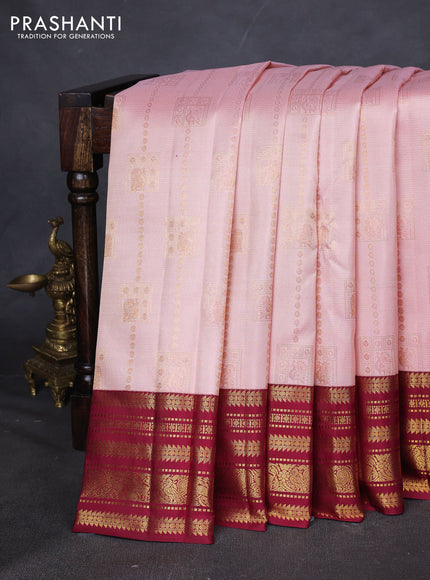Pure kanchipuram silk saree peach pink and maroon with allover zari weaves and zari woven korvai border