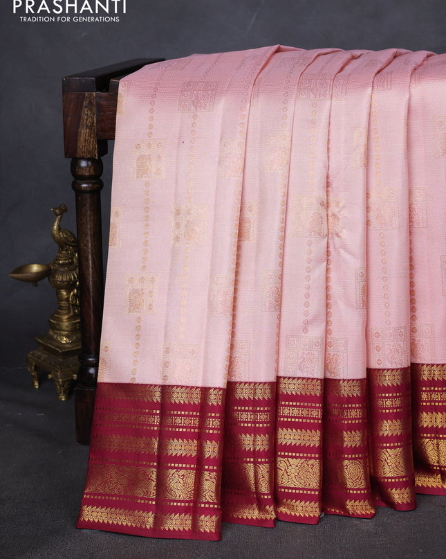 Pure kanchipuram silk saree peach pink and maroon with allover zari weaves and zari woven korvai border