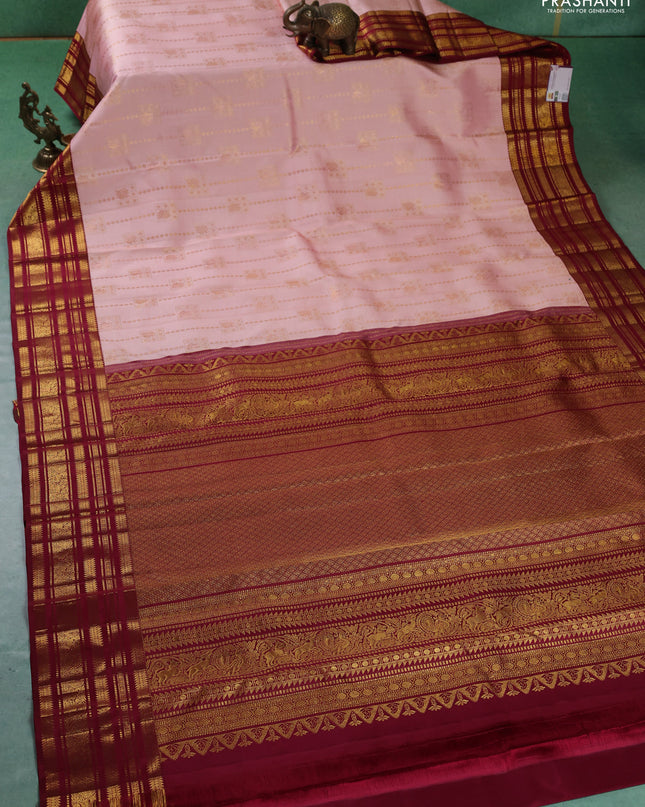Pure kanchipuram silk saree peach pink and maroon with allover zari weaves and zari woven korvai border