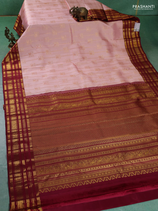 Pure kanchipuram silk saree peach pink and maroon with allover zari weaves and zari woven korvai border