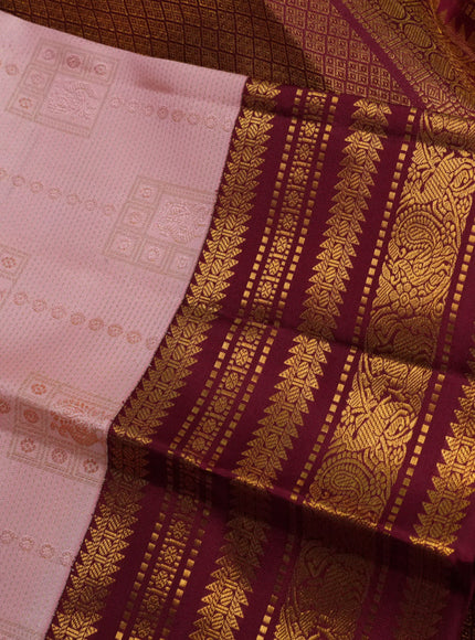 Pure kanchipuram silk saree peach pink and maroon with allover zari weaves and zari woven korvai border