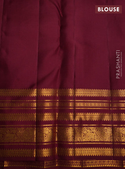 Pure kanchipuram silk saree peach pink and maroon with allover zari weaves and zari woven korvai border