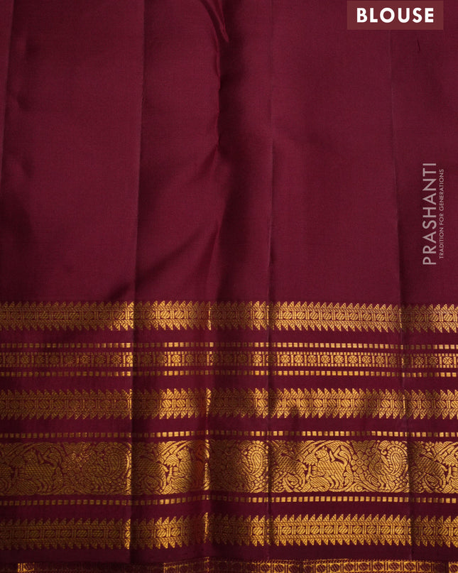 Pure kanchipuram silk saree peach pink and maroon with allover zari weaves and zari woven korvai border