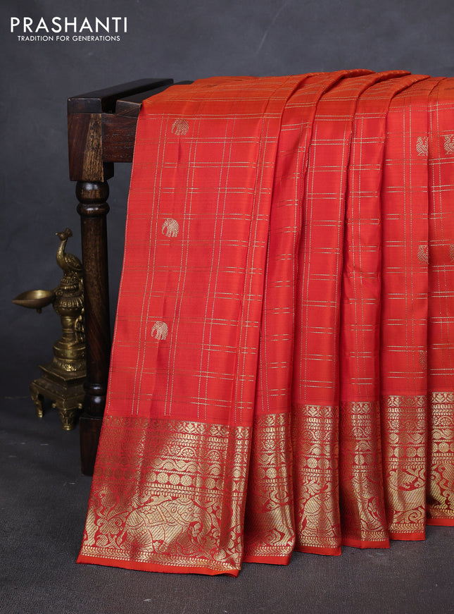 Pure kanchipuram silk saree orange with allover zari checks & buttas and zari woven border
