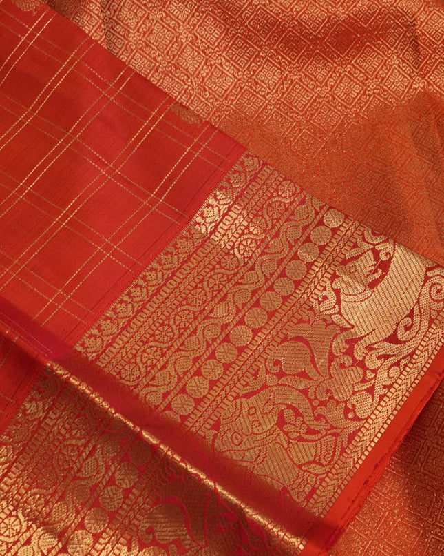 Pure kanchipuram silk saree orange with allover zari checks & buttas and zari woven border