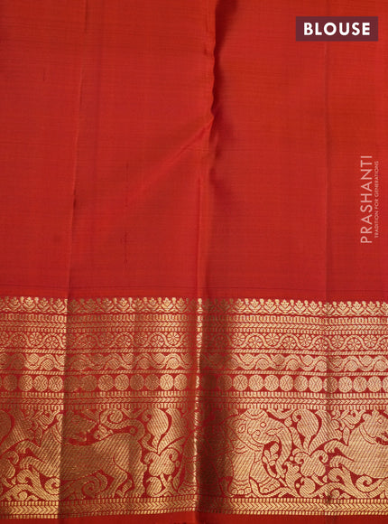 Pure kanchipuram silk saree orange with allover zari checks & buttas and zari woven border