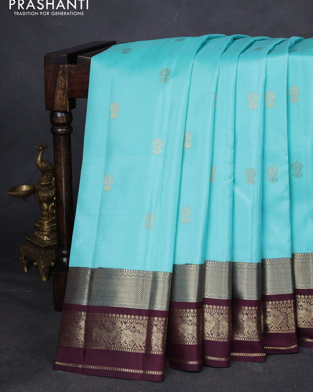 Pure kanchipuram silk saree teal blue and coffee brown with zari woven buttas and zari woven border