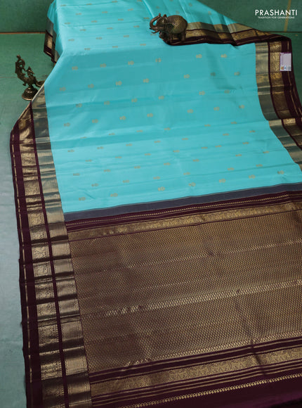 Pure kanchipuram silk saree teal blue and coffee brown with zari woven buttas and zari woven border