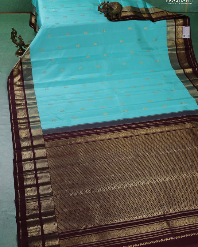 Pure kanchipuram silk saree teal blue and coffee brown with zari woven buttas and zari woven border