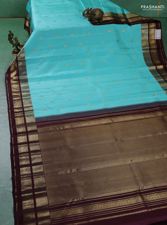 Pure kanchipuram silk saree teal blue and coffee brown with zari woven buttas and zari woven border