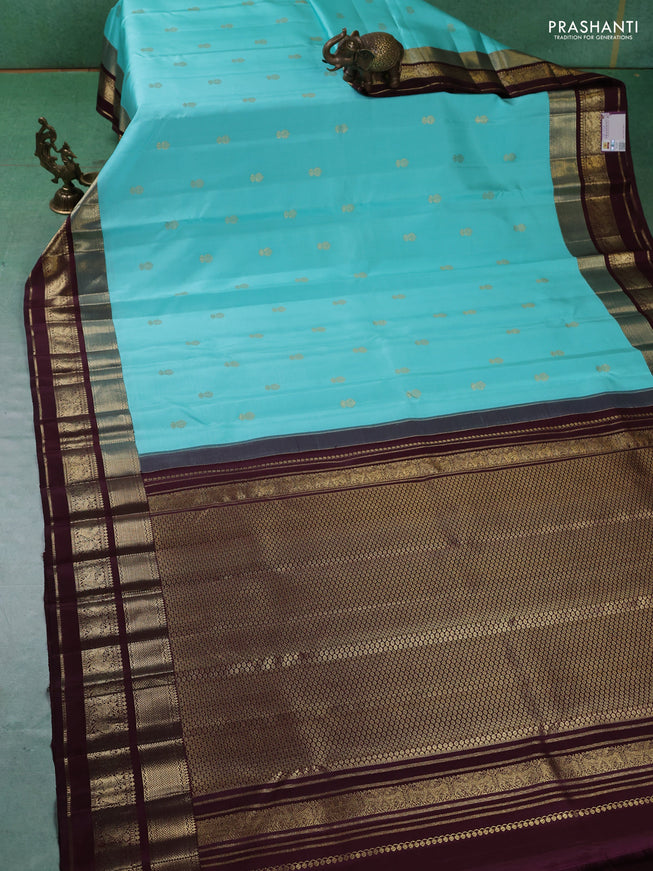 Pure kanchipuram silk saree teal blue and coffee brown with zari woven buttas and zari woven border