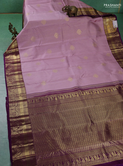 Pure kanchipuram silk saree pastel pink and purple with allover zari checks & buttas and zari woven korvai border