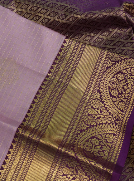 Pure kanchipuram silk saree pastel pink and purple with allover zari checks & buttas and zari woven korvai border