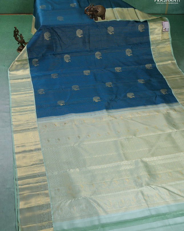 Pure kanchipuram silk saree peacock blue and pista green with allover zari checks & buttas and zari woven korvai border