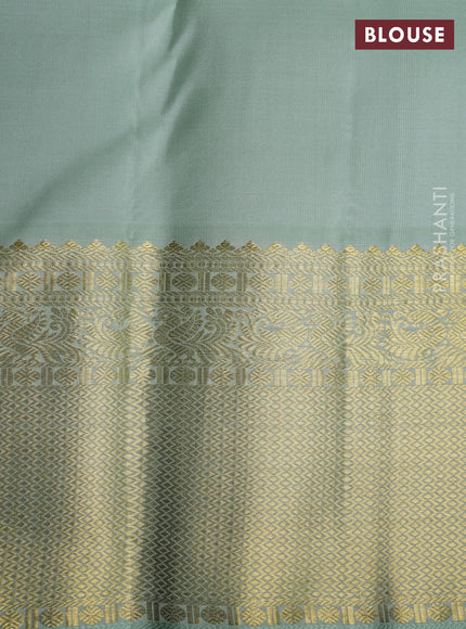 Pure kanchipuram silk saree peacock blue and pista green with allover zari checks & buttas and zari woven korvai border