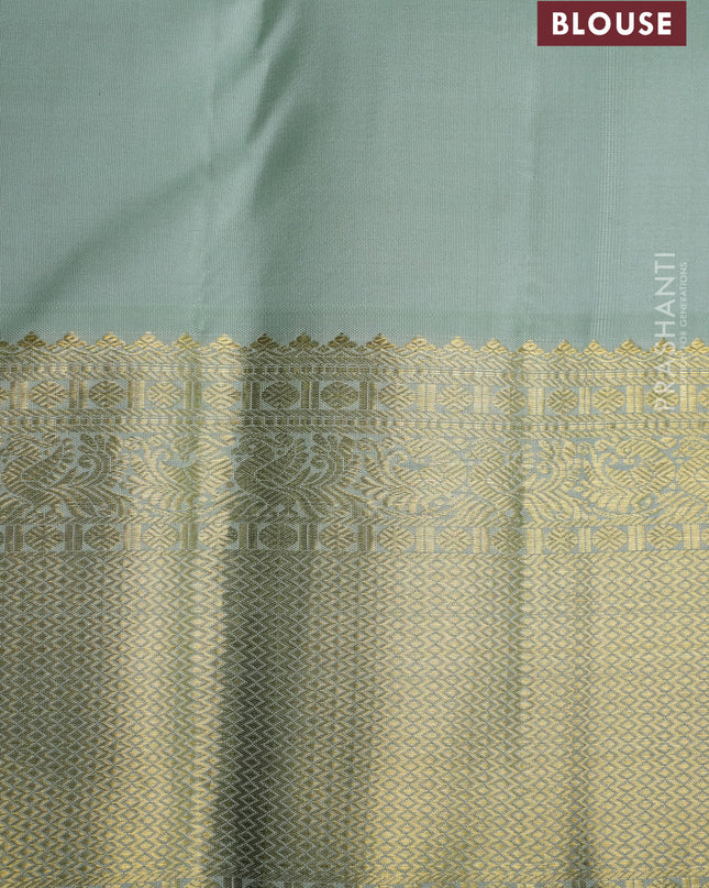 Pure kanchipuram silk saree peacock blue and pista green with allover zari checks & buttas and zari woven korvai border
