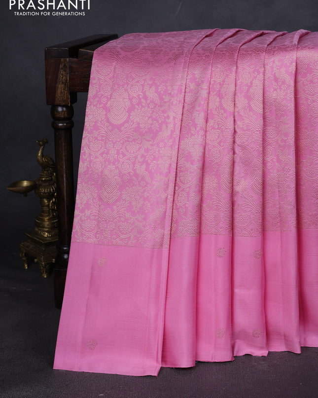 Pure kanchipuram silk saree light pink with allover zari woven brocade weaves and zari woven butta border