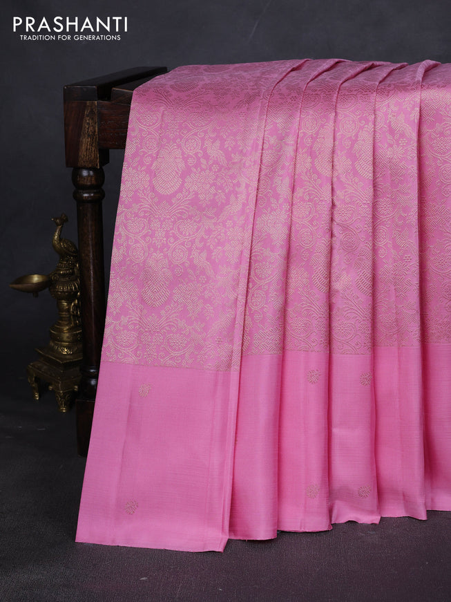 Pure kanchipuram silk saree light pink with allover zari woven brocade weaves and zari woven butta border