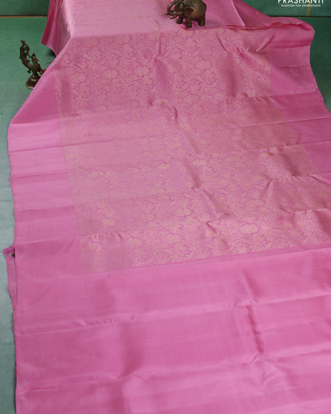 Pure kanchipuram silk saree light pink with allover zari woven brocade weaves and zari woven butta border
