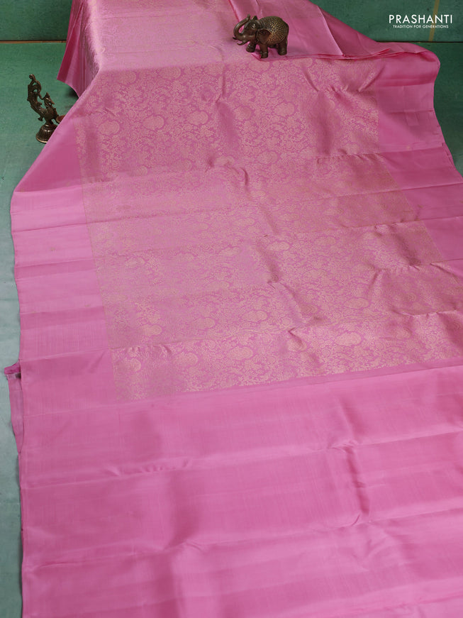 Pure kanchipuram silk saree light pink with allover zari woven brocade weaves and zari woven butta border