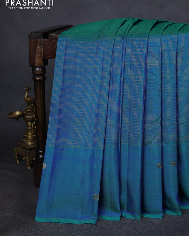 Pure kanchipuram silk saree teal blue with allover small zari checked pattern and zari woven butta border