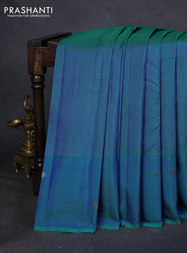 Pure kanchipuram silk saree teal blue with allover small zari checked pattern and zari woven butta border