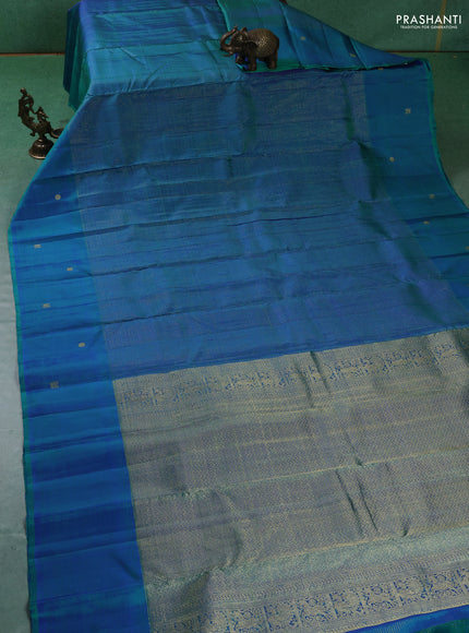 Pure kanchipuram silk saree teal blue with allover small zari checked pattern and zari woven butta border
