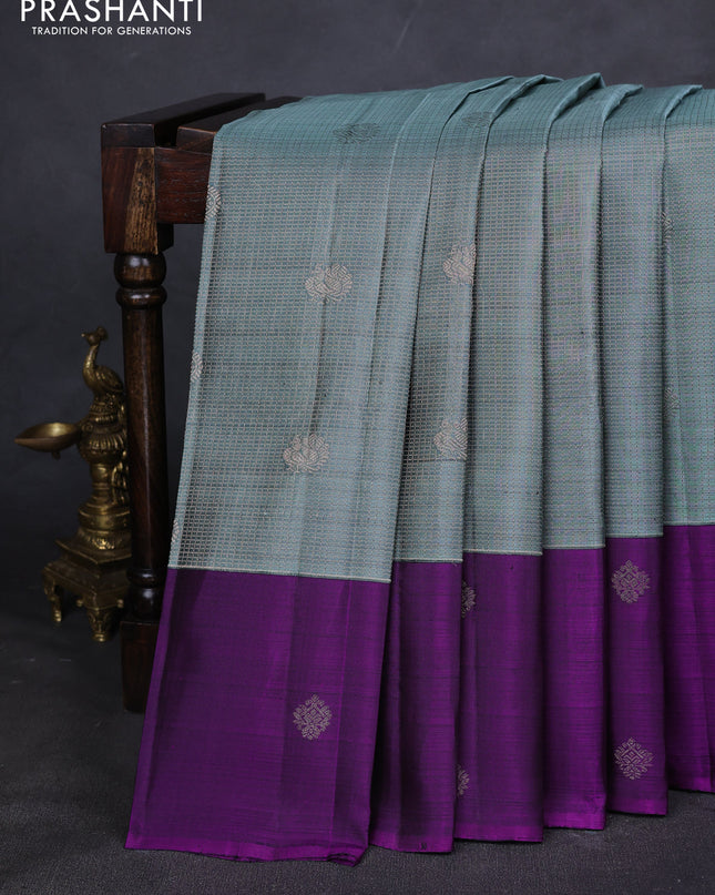 Pure kanchipuram silk saree pastel blue and purple with allover zari checks & buttas and zari woven butta border