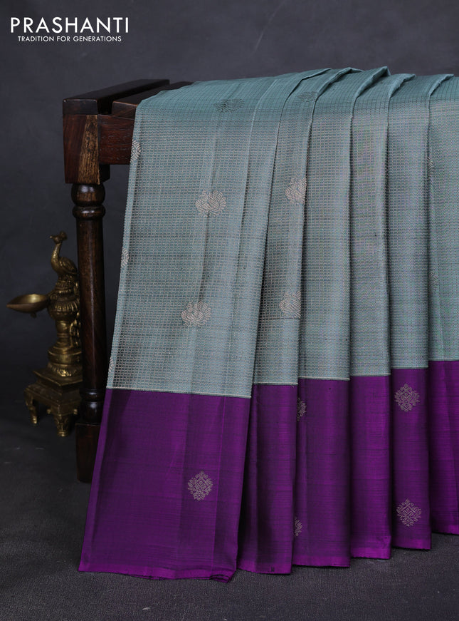 Pure kanchipuram silk saree pastel blue and purple with allover zari checks & buttas and zari woven butta border