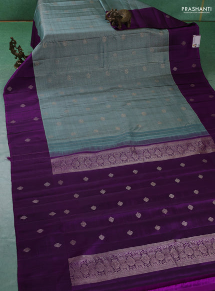 Pure kanchipuram silk saree pastel blue and purple with allover zari checks & buttas and zari woven butta border