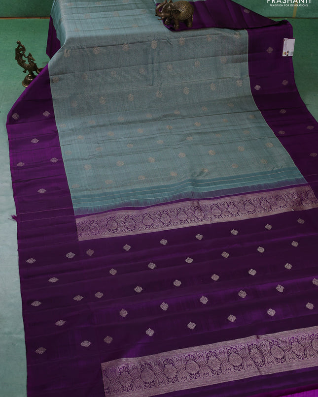 Pure kanchipuram silk saree pastel blue and purple with allover zari checks & buttas and zari woven butta border