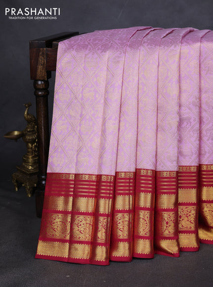 Pure kanchipuram silk saree light pink and red with allover zari woven brocade weaves and zari woven border