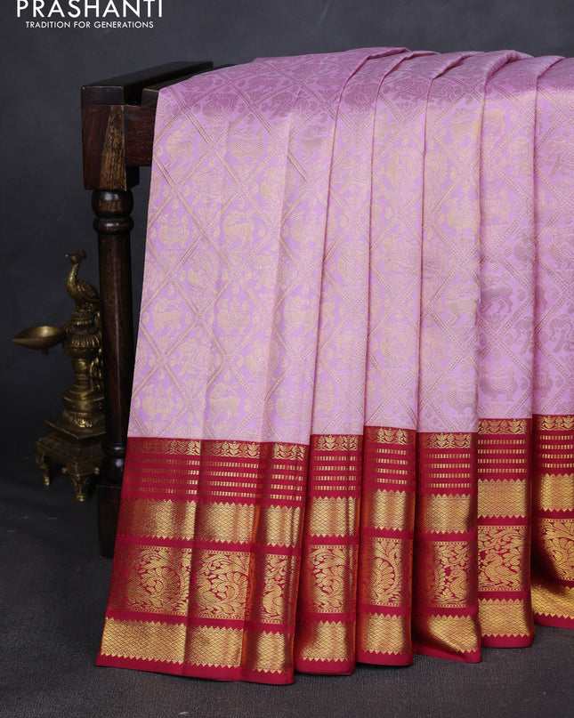 Pure kanchipuram silk saree light pink and red with allover zari woven brocade weaves and zari woven border