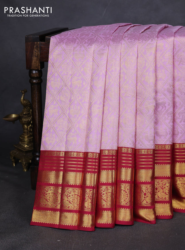 Pure kanchipuram silk saree light pink and red with allover zari woven brocade weaves and zari woven border