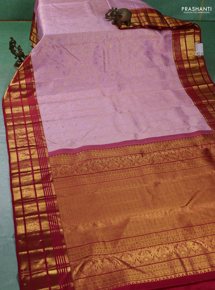 Pure kanchipuram silk saree light pink and red with allover zari woven brocade weaves and zari woven border