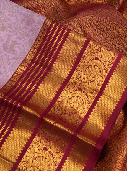 Pure kanchipuram silk saree light pink and red with allover zari woven brocade weaves and zari woven border