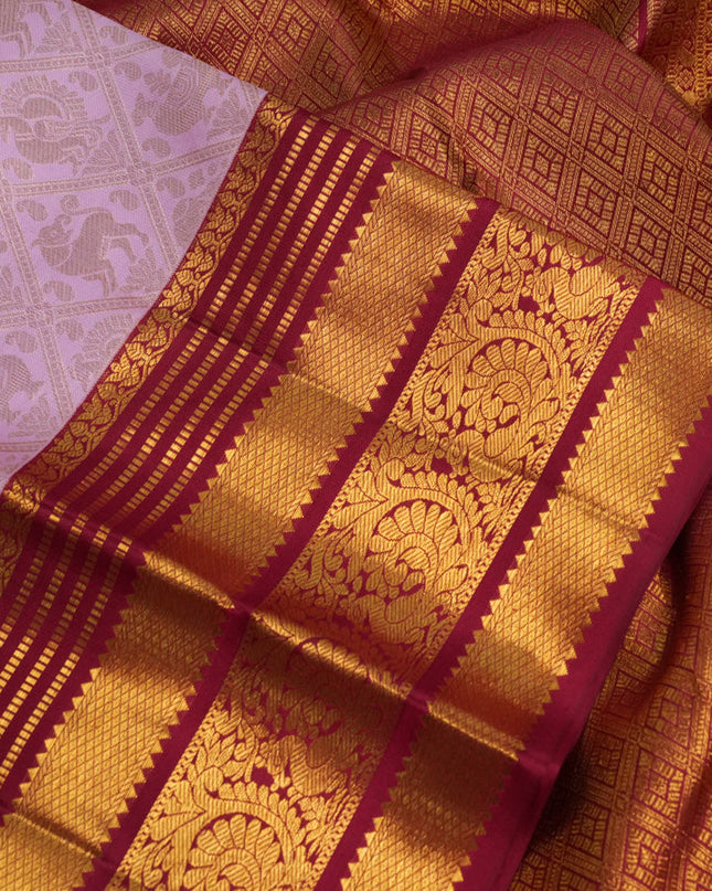 Pure kanchipuram silk saree light pink and red with allover zari woven brocade weaves and zari woven border