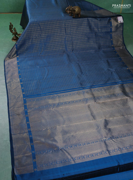 Pure kanchipuram silk saree peacock blue with allover zari checks and zari woven border