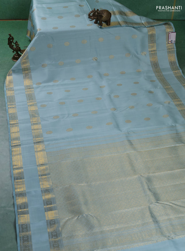 Pure kanchipuram silk saree pastel blue with zari woven buttas and rettapet zari woven border