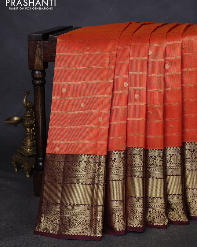 Pure kanchipuram silk saree orange and coffee brown with allover zari woven brocade weaves and zari woven border