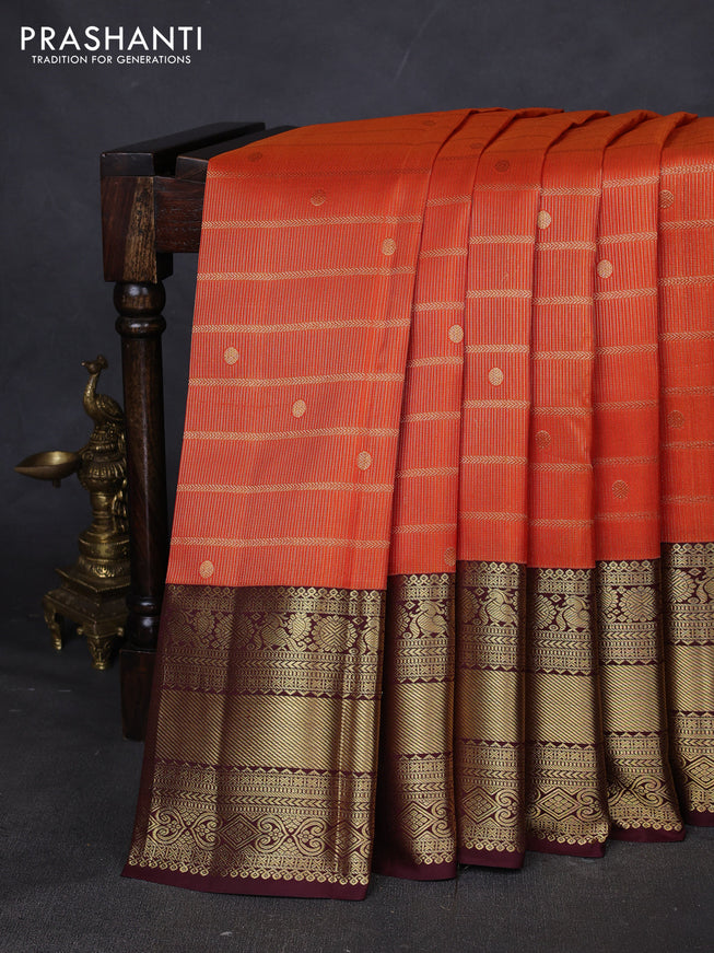 Pure kanchipuram silk saree orange and coffee brown with allover zari woven brocade weaves and zari woven border
