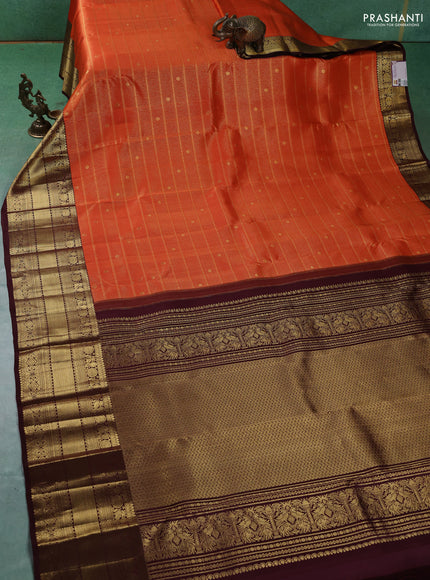 Pure kanchipuram silk saree orange and coffee brown with allover zari woven brocade weaves and zari woven border