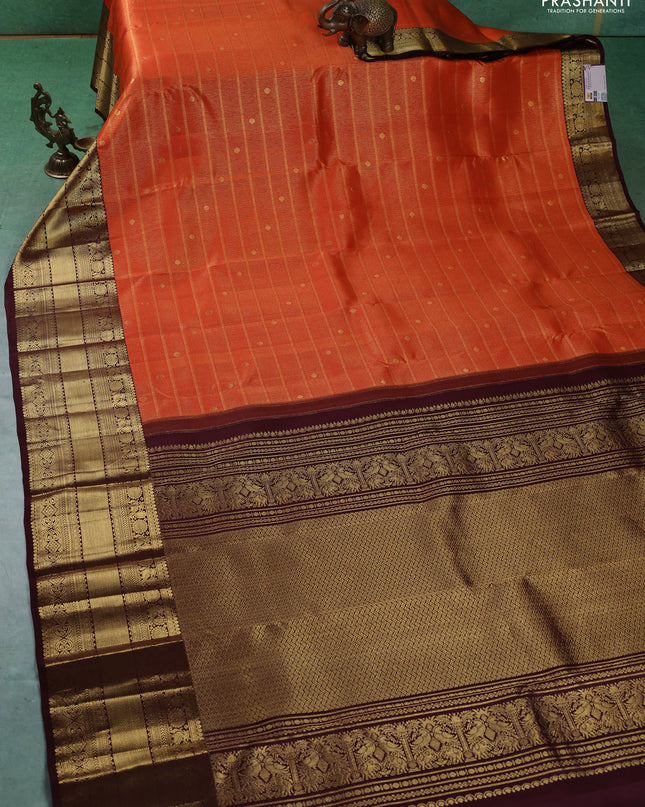 Pure kanchipuram silk saree orange and coffee brown with allover zari woven brocade weaves and zari woven border