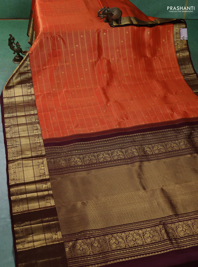 Pure kanchipuram silk saree orange and coffee brown with allover zari woven brocade weaves and zari woven border