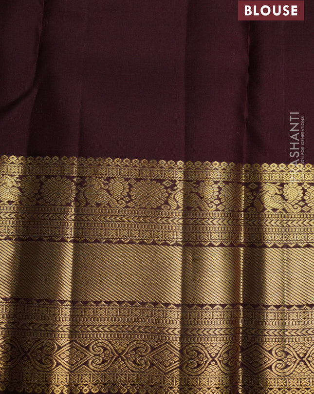 Pure kanchipuram silk saree orange and coffee brown with allover zari woven brocade weaves and zari woven border