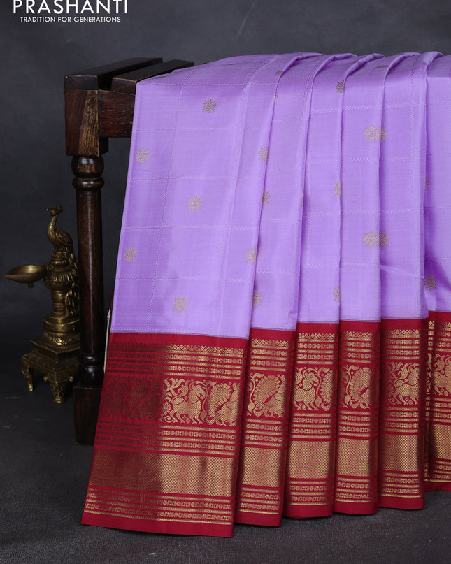 Pure kanchipuram silk saree lavender and maroon with allover self emboss & zari buttas and long rich zari woven korvai border